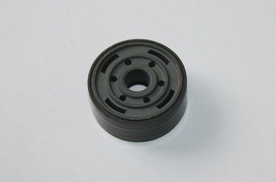 Serat kaca dan piston kejut berpita PTFE yang diisi MoS2 dengan gesekan rendah