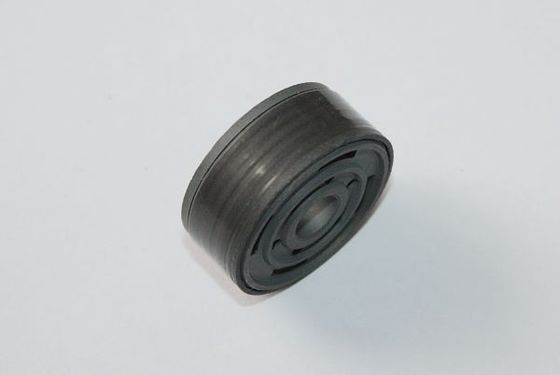 Serat kaca dan piston kejut berpita PTFE yang diisi MoS2 dengan gesekan rendah