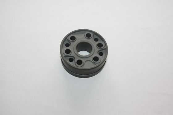 Piston peredam sinter Fe – C – Cu dengan alur lebar dengan pita PTFE untuk guncangan mobil